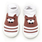 Pair of toddler sock shoes with a brown bear design, white socks, and white soles.