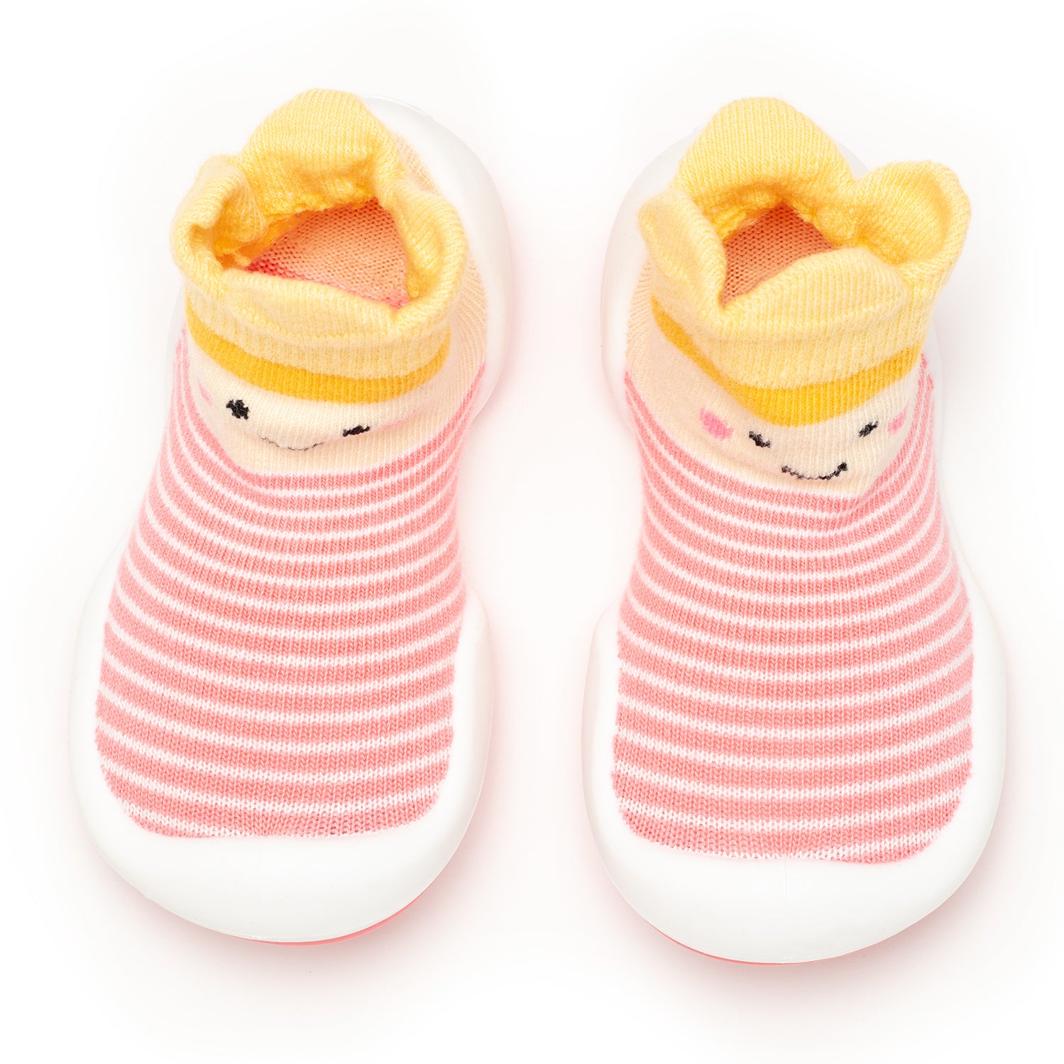 Two baby socks with white soles. The socks are striped pink and white with a yellow cuff that has a smiling face.