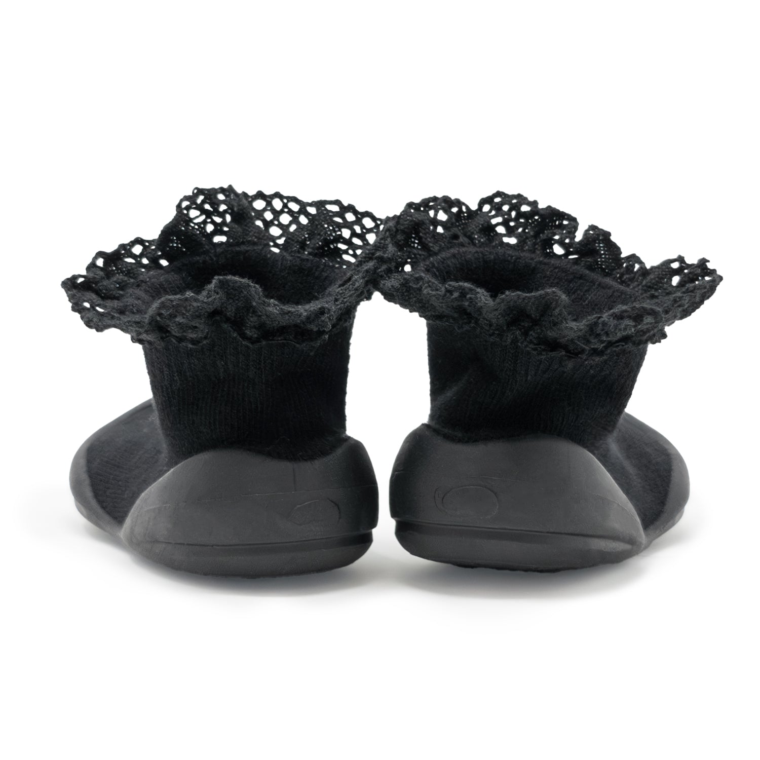 Two black baby slipper-socks with lace trim.
