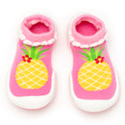 Pink baby socks with pineapple design.
