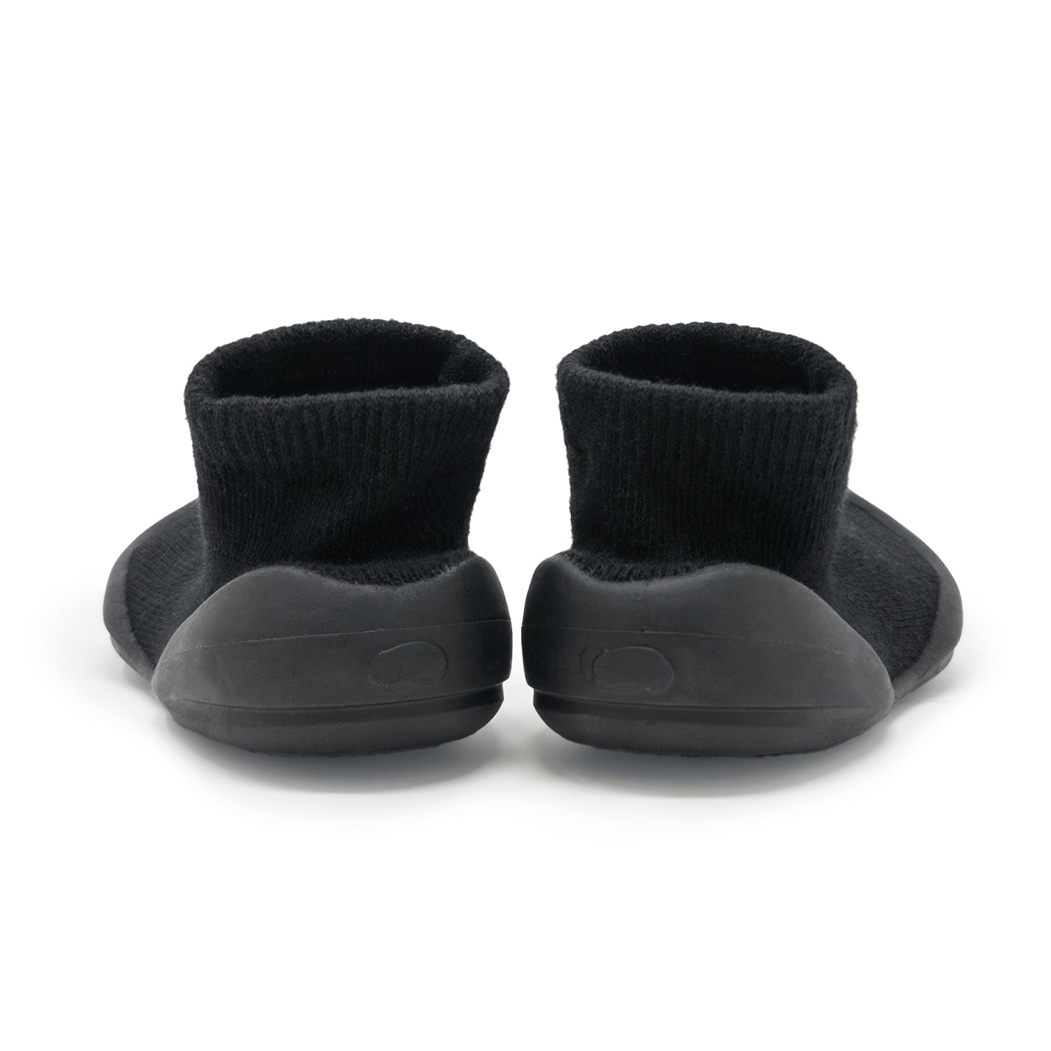 Two black baby shoe-socks, rear view.