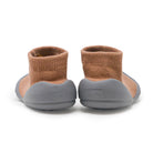 Pair of baby shoes, brown sock top, gray sole.