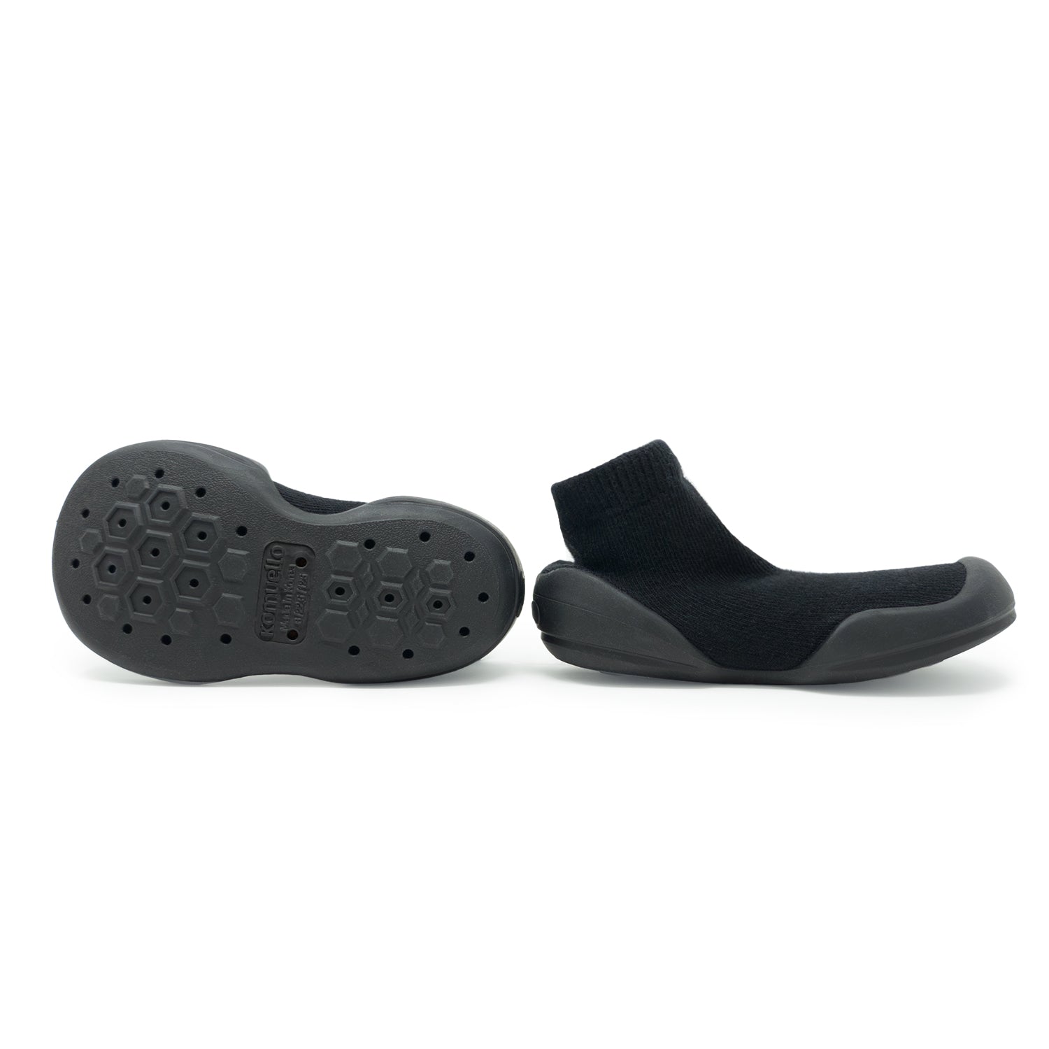 A pair of black sock shoes.