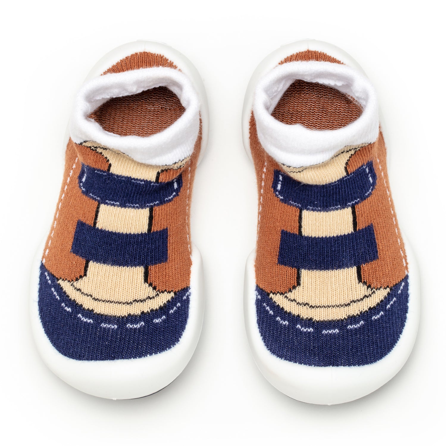 A pair of baby shoe socks with white soles.