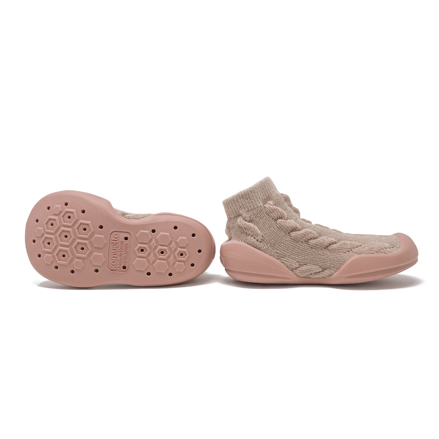 Two pink sock-like shoes, one showing the sole.
