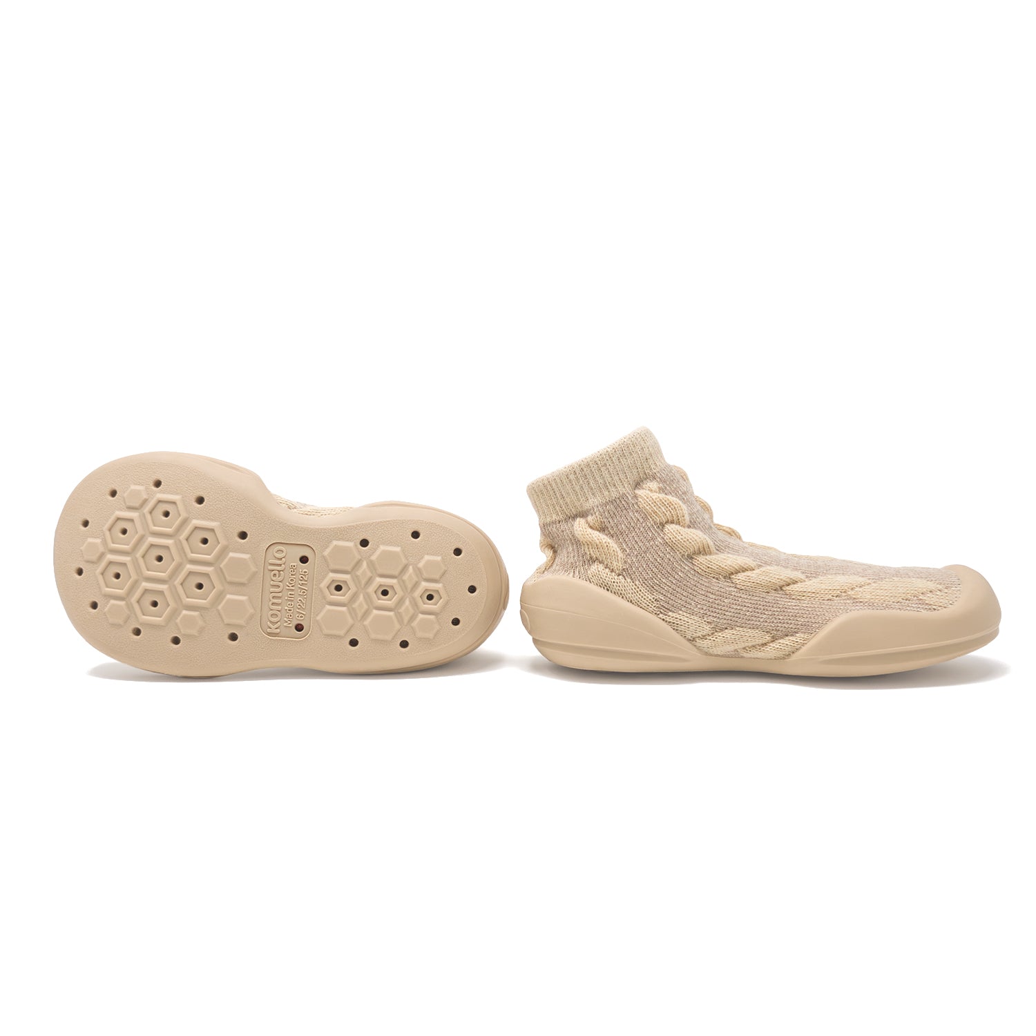 Two beige knit slip-on shoes, one showing the sole.