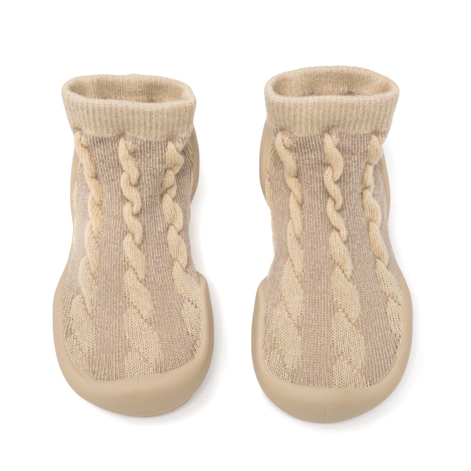 Two beige knitted baby socks.