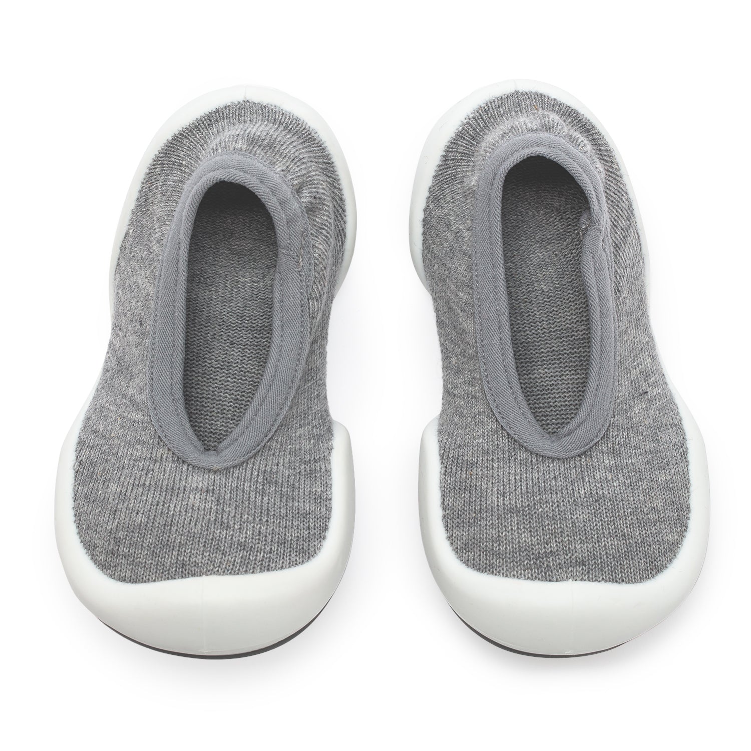A pair of gray knit baby shoes with white soles.
