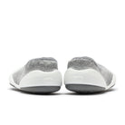 Two gray and white baby shoes, rear view.