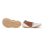 Tan and white baby shoe with brown and blue stripes.