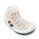 Beige sock shoe with red and blue squares.
