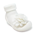 White baby sock with white flower accent.