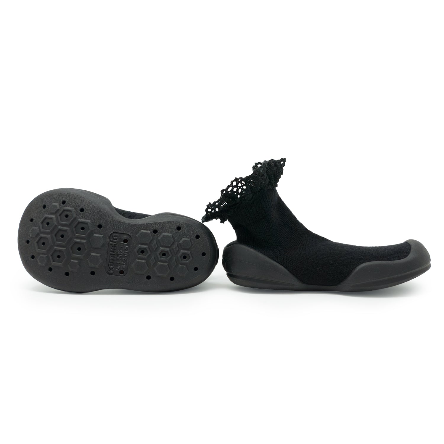 Two black sock shoes with lace trim on white background.