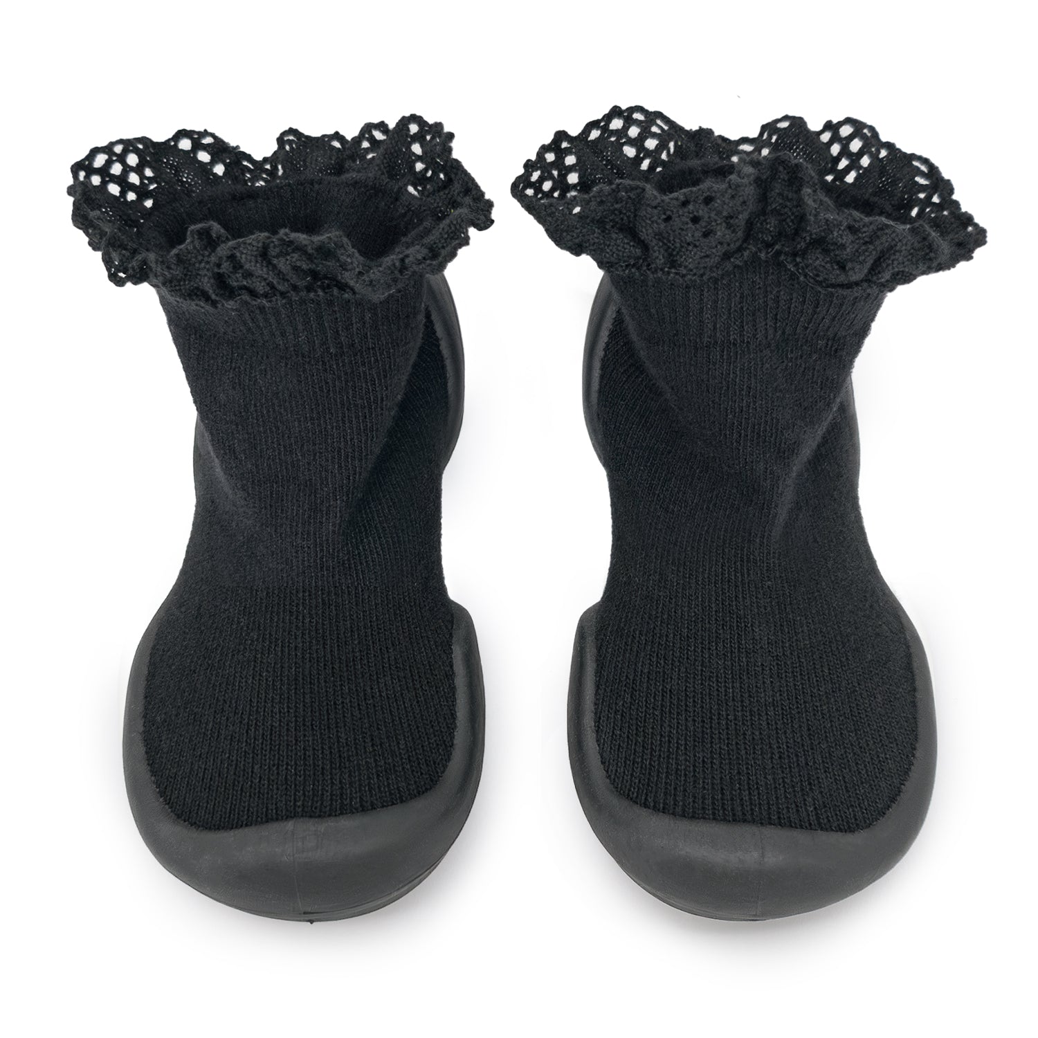 Two black baby sock shoes with ruffled lace tops.