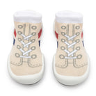 Two baby sock shoes, cream with printed laces, white ankle cuff and white soles.