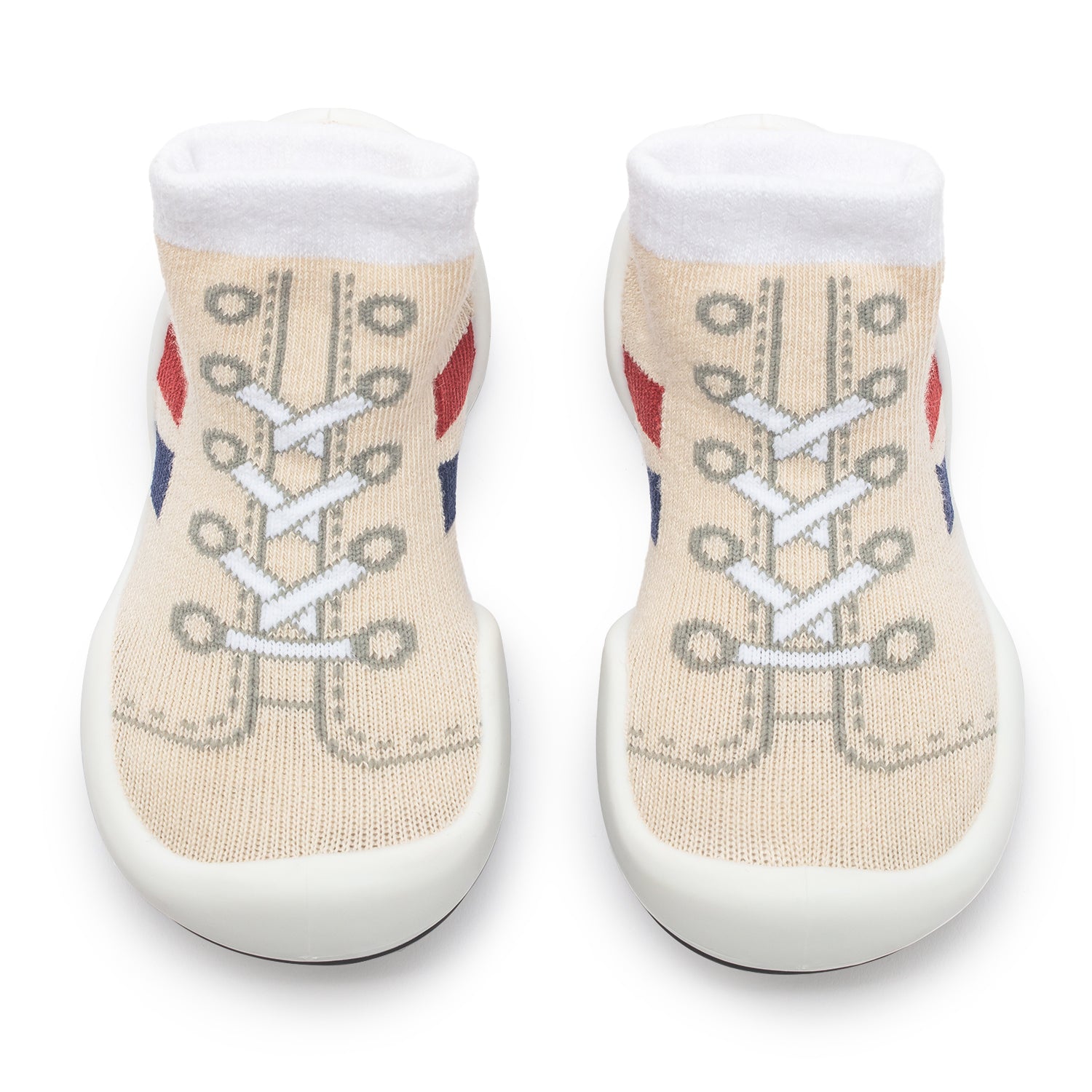 Two baby sock shoes, cream with printed laces, white ankle cuff and white soles.