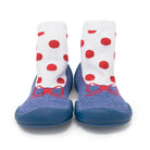 Pair of blue sock shoes with red dots.