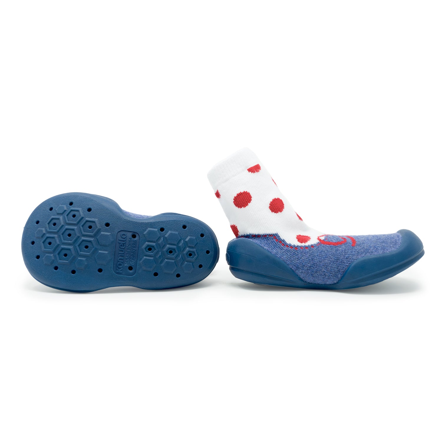 A sock-shoe hybrid with a blue sole and a white sock with red polka dots.