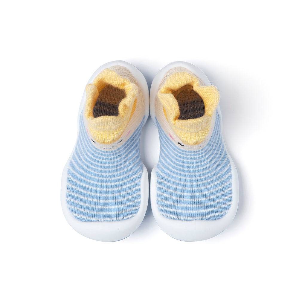 Two blue and white striped baby shoes with yellow cuffs.