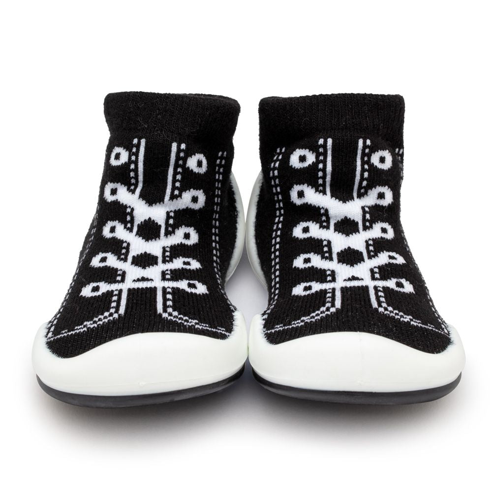 Pair of black and white sneaker socks.