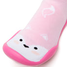 Close-up of a pink sock-shoe with a white fox face and pink sole.