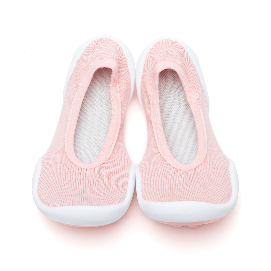 Pair of pink baby slipper shoes.