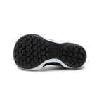 Bottom of black and white shoe.