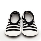 Pair of black and white striped baby shoes.