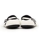 Rear view of black and white striped baby shoes.