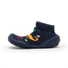 Dark blue slipper sock with dinosaur design.