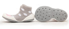 Pair of gray and white baby shoes with polka dots.