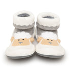 Pair of infant sheep slipper socks.