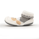 Sock shoe with light-grey rubber sole, white toe and cuff with tan and grey stripes.