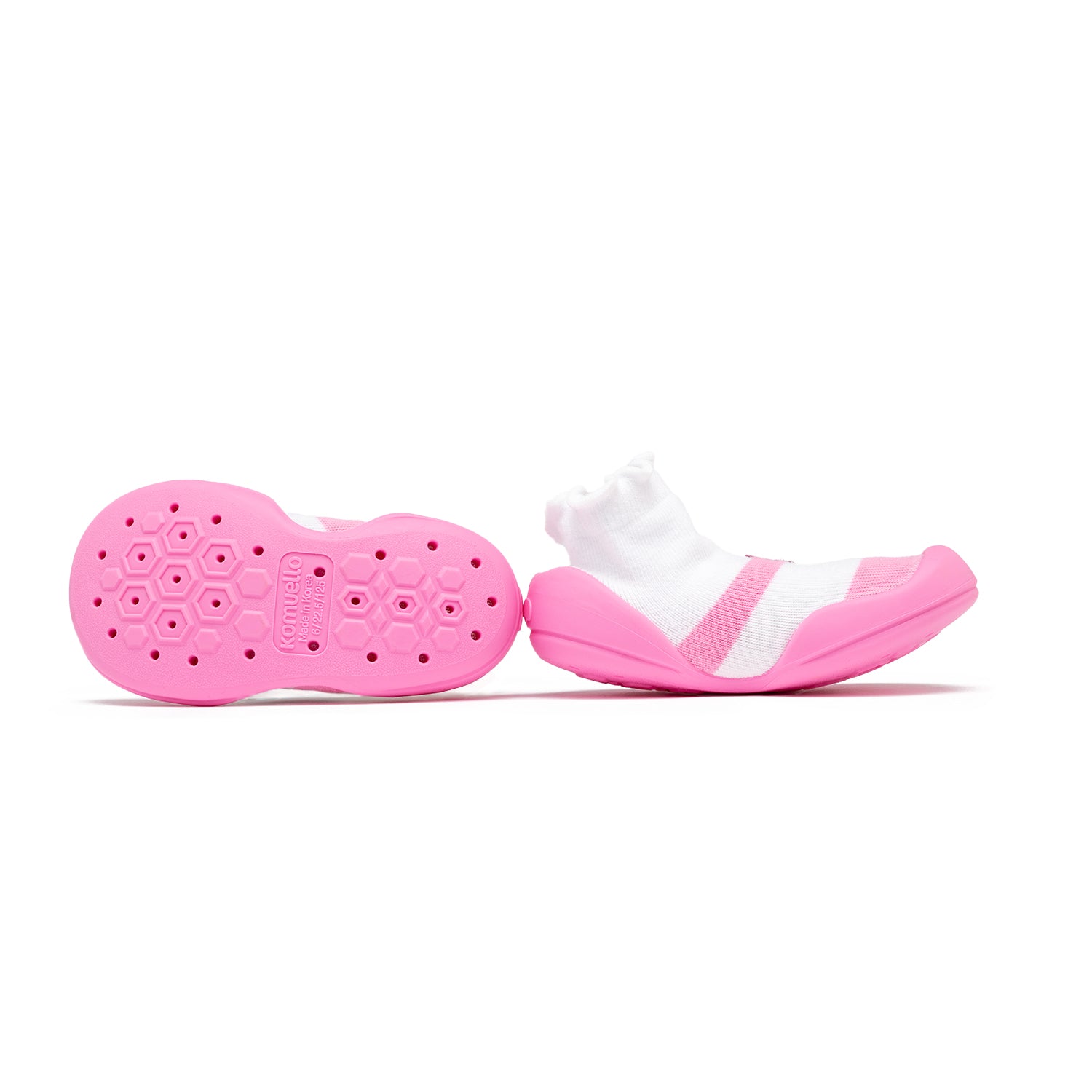Pair of pink and white baby shoes.