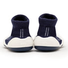 Back view of navy blue and white baby shoes.