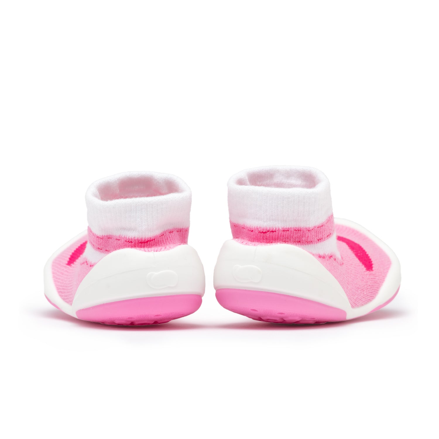 Two pink and white baby shoes viewed from the back.
