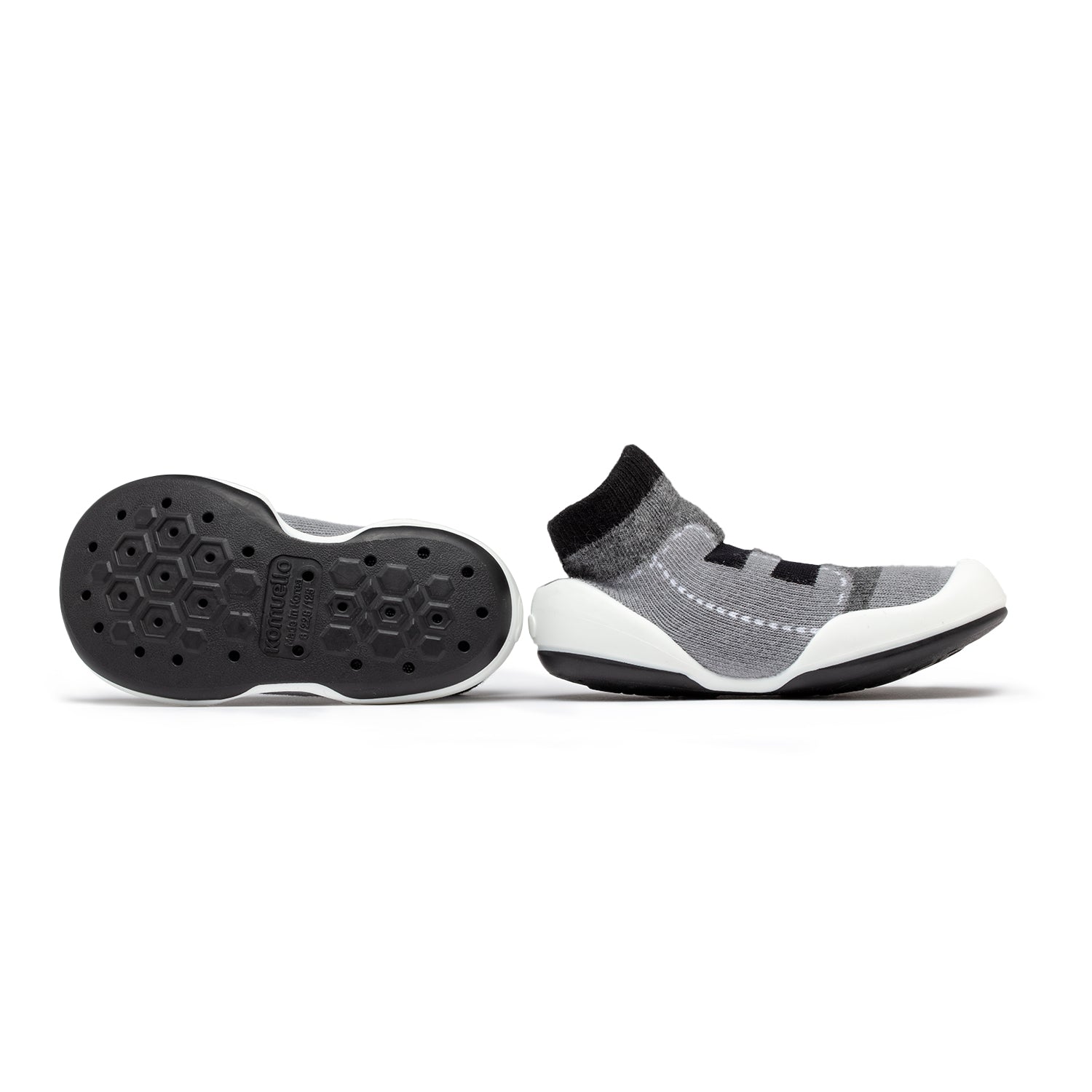 Gray sock-shoe on white background.