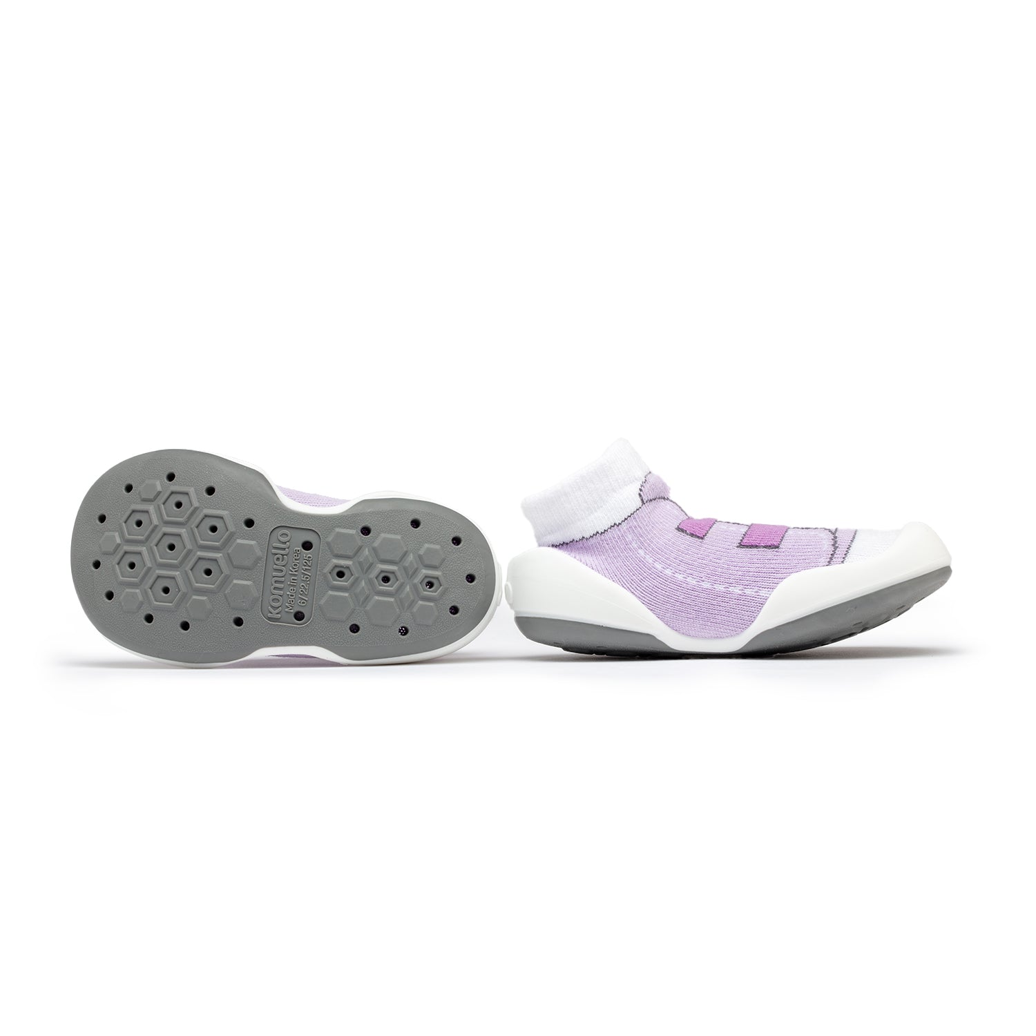 Pair of lavender and white baby shoes.
