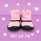 Pink sock shoes with black soles on a purple background with white hearts.