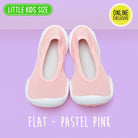 Pair of pastel pink toddler shoes.