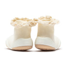 Pair of ivory baby sock shoes with crochet trim.