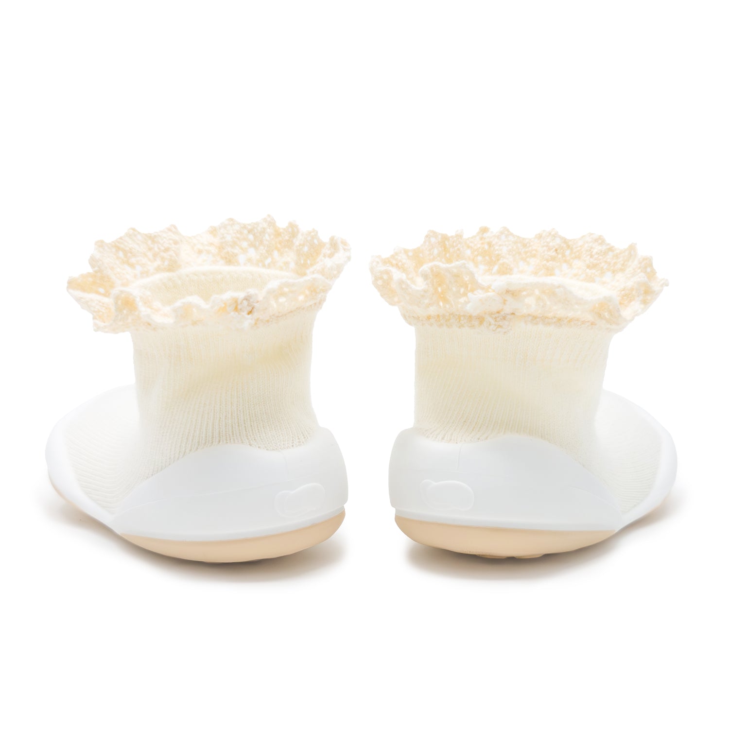 Pair of ivory baby sock shoes with crochet trim.