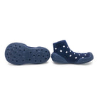 Two blue baby shoes with white polka dots.