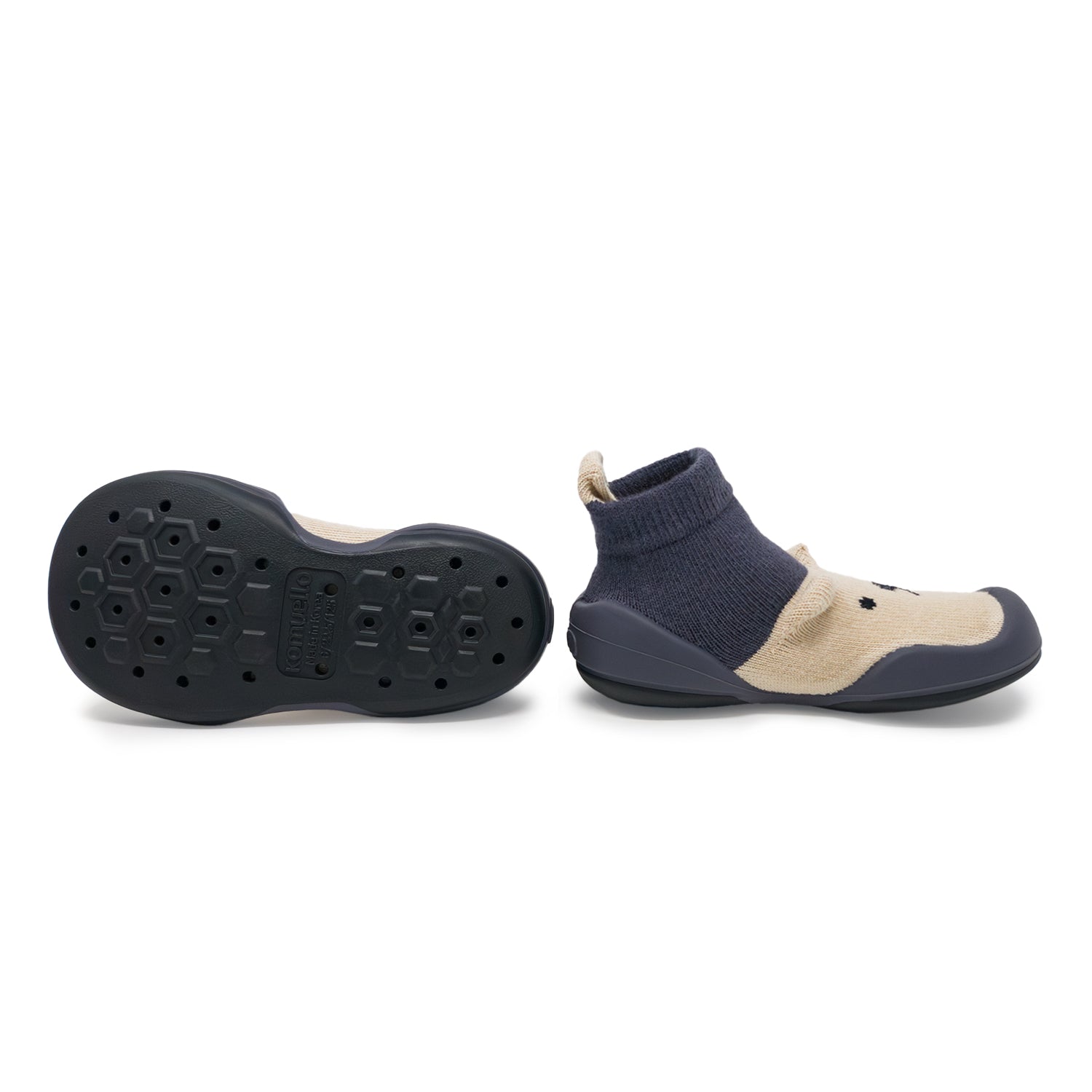 Pair of child's shoe-socks in navy and tan.